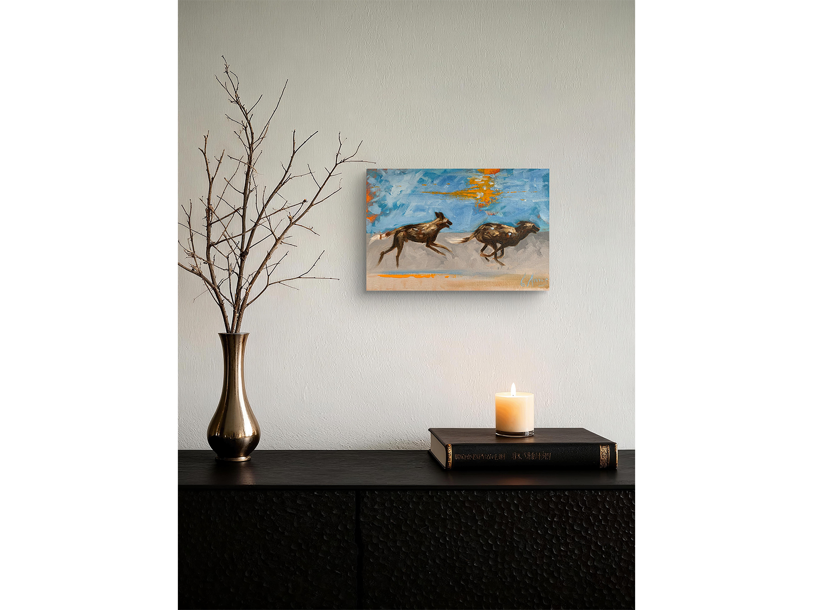 Expressive oil painting of two African wild dogs running mid-stride against a blue background with bright orange impasto accents by Charles Amos.